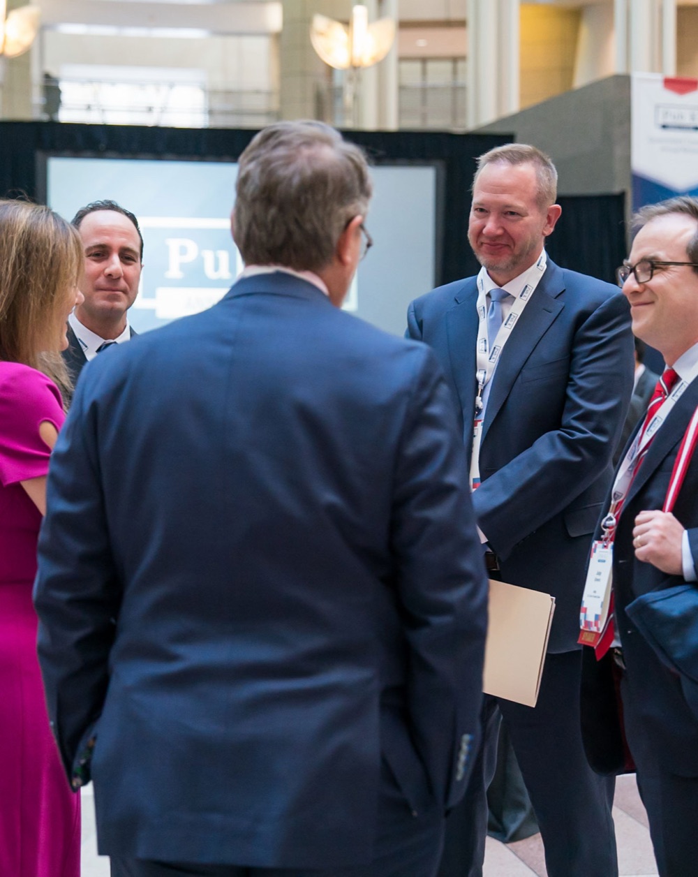 Members in conversation at the Pub K Annual Review